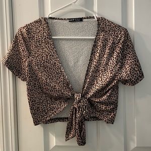 Leopard Print Crop/Tie Shirt. Multiple ways to style and tie!